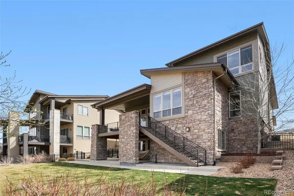 a front view of a house with yard
