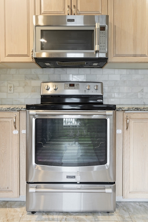 22 Arrowhead Circle, Unit 22 Ashland, MA 01721 - Photo 10 of 35 a stove top oven sitting inside of a kitchen