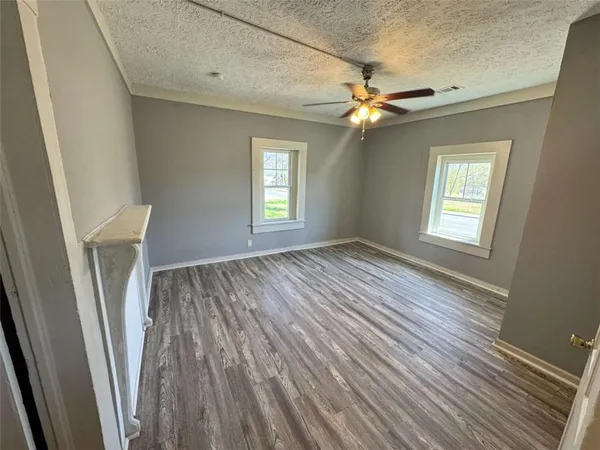 a bathroom with a toilet sink and shower