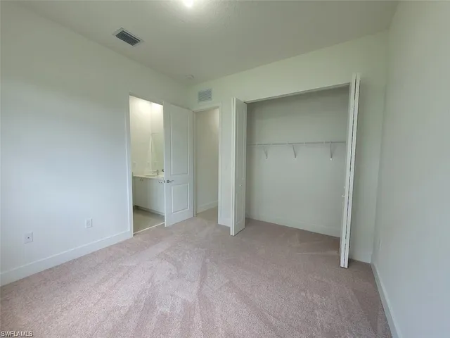 an empty room with an entryway