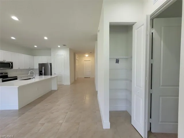 a view of kitchen with sink