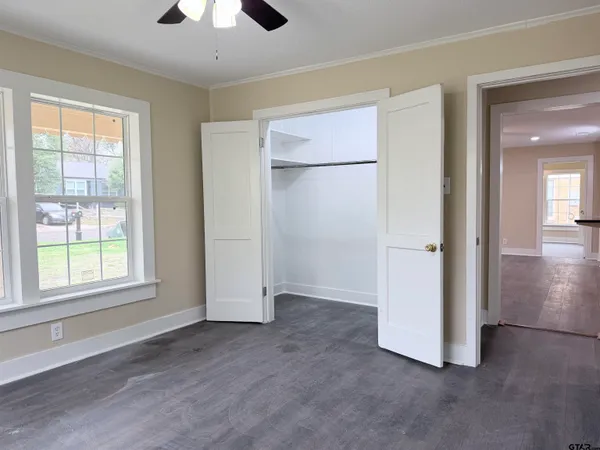 a view of an empty room with a window