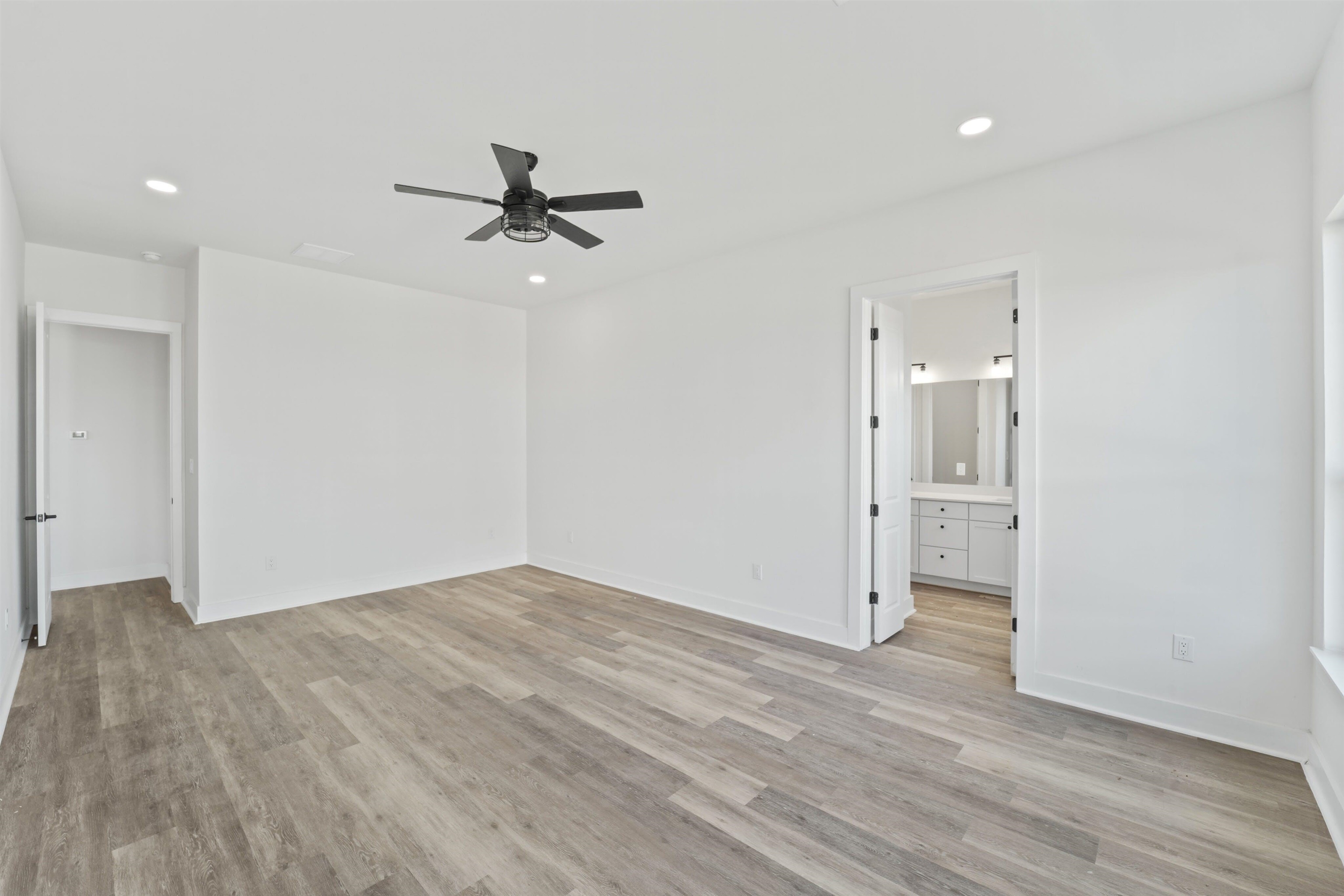 100 Up There Horseshoe Bay, TX 78657 - Photo 14 of 28 wooden floor in an empty room with a window