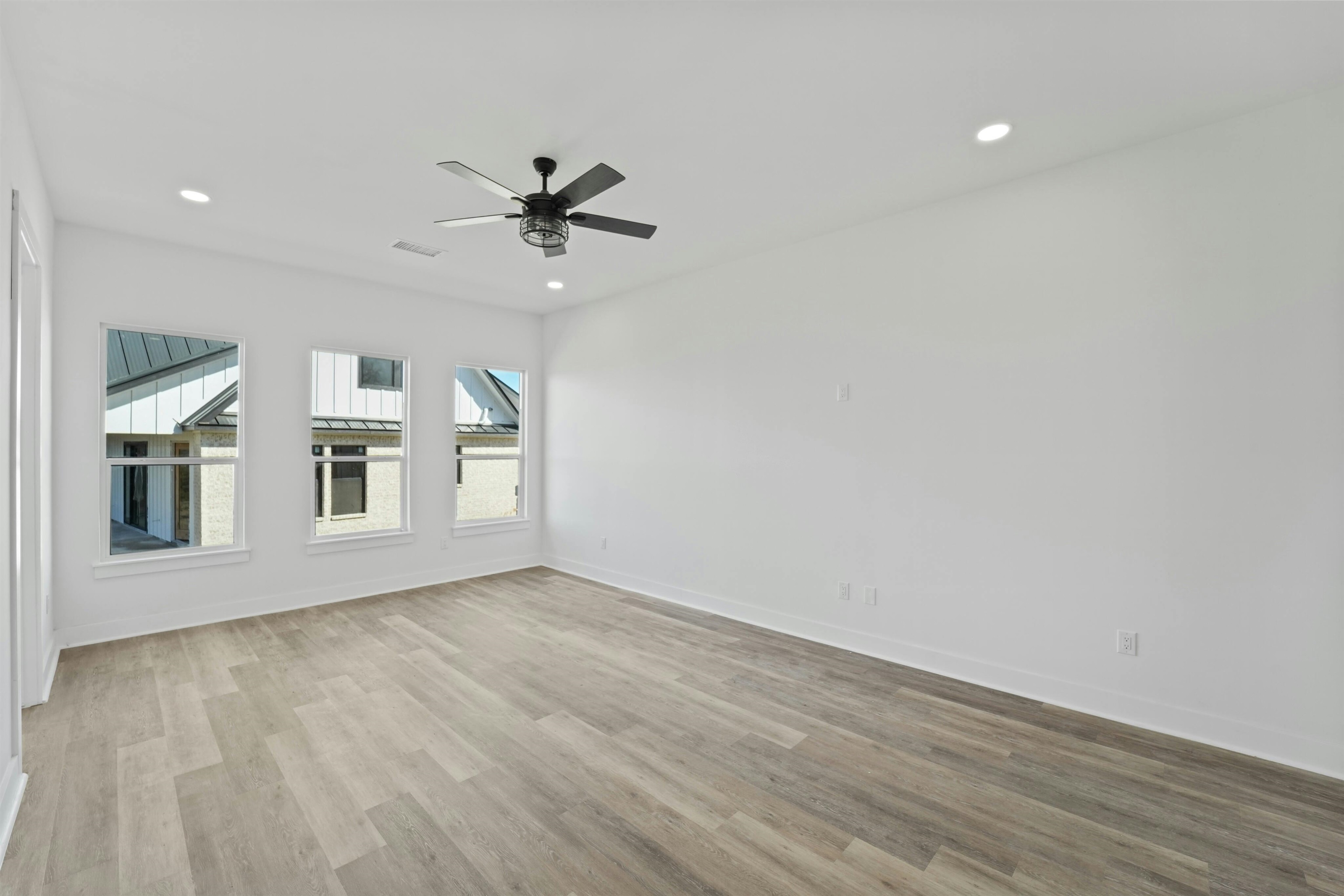 100 Up There Horseshoe Bay, TX 78657 - Photo 15 of 28 wooden floor in an empty room with a window