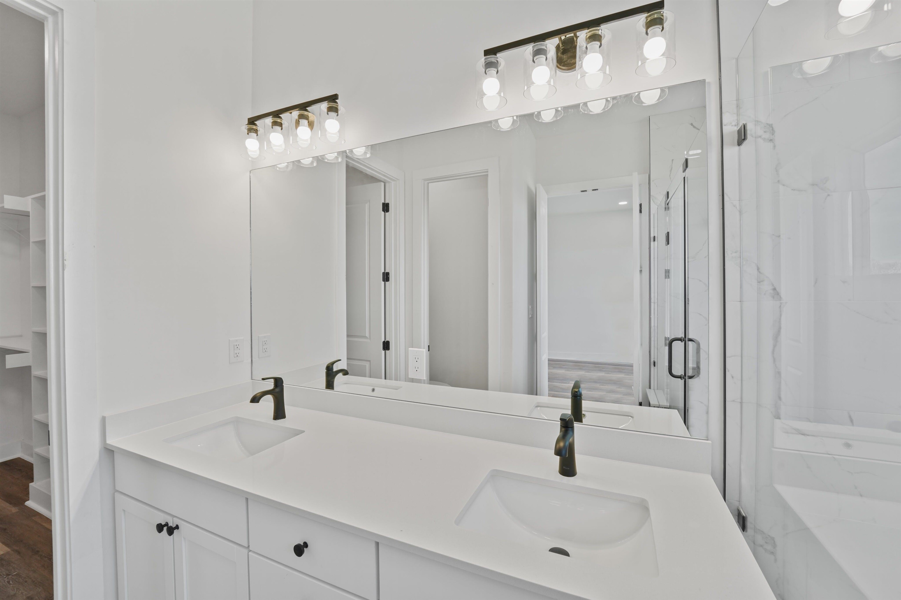 100 Up There Horseshoe Bay, TX 78657 - Photo 16 of 28 a bathroom with a sink and a mirror