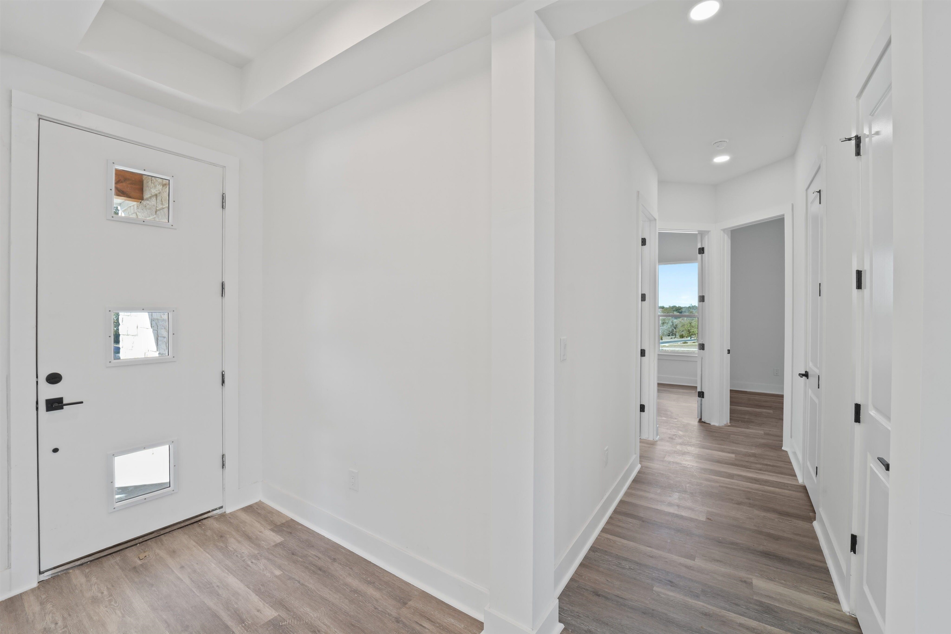 100 Up There Horseshoe Bay, TX 78657 - Photo 19 of 28 a view of a hallway with wooden floor