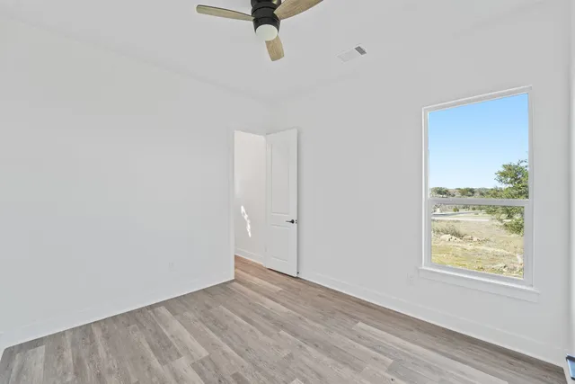 an empty room with window