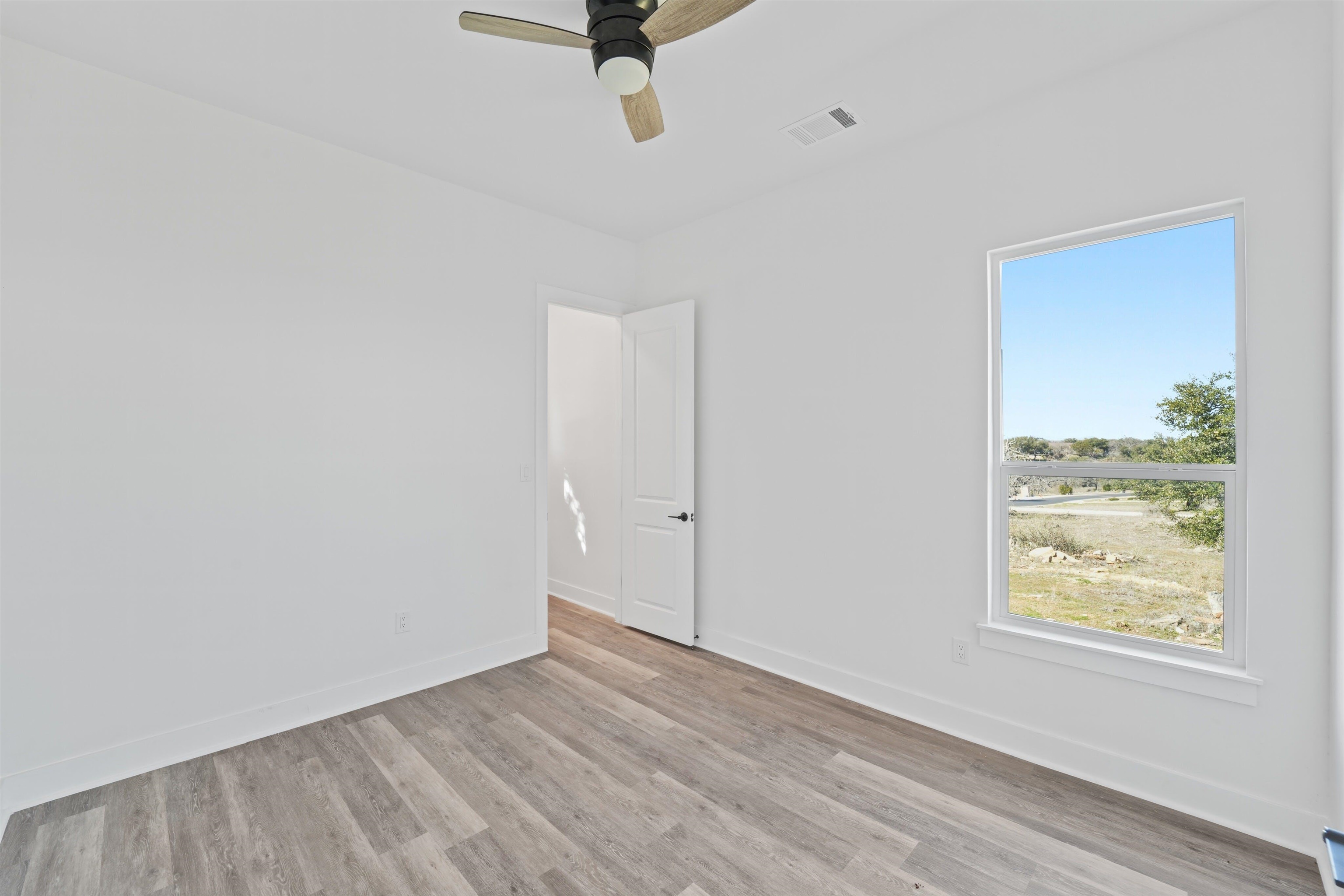 100 Up There Horseshoe Bay, TX 78657 - Photo 20 of 28 an empty room with window