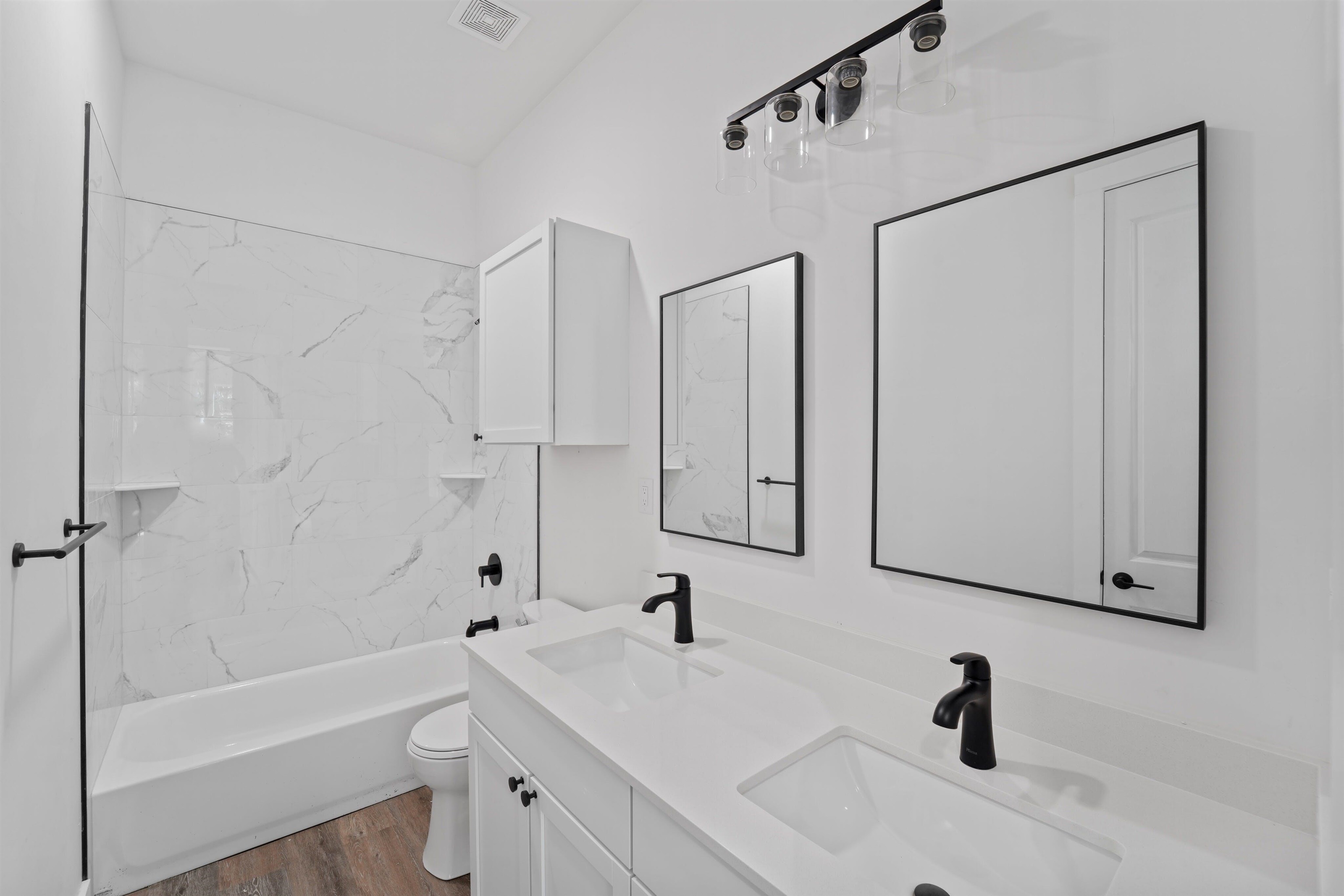 100 Up There Horseshoe Bay, TX 78657 - Photo 28 of 28 a bathroom with a tub sink and mirror