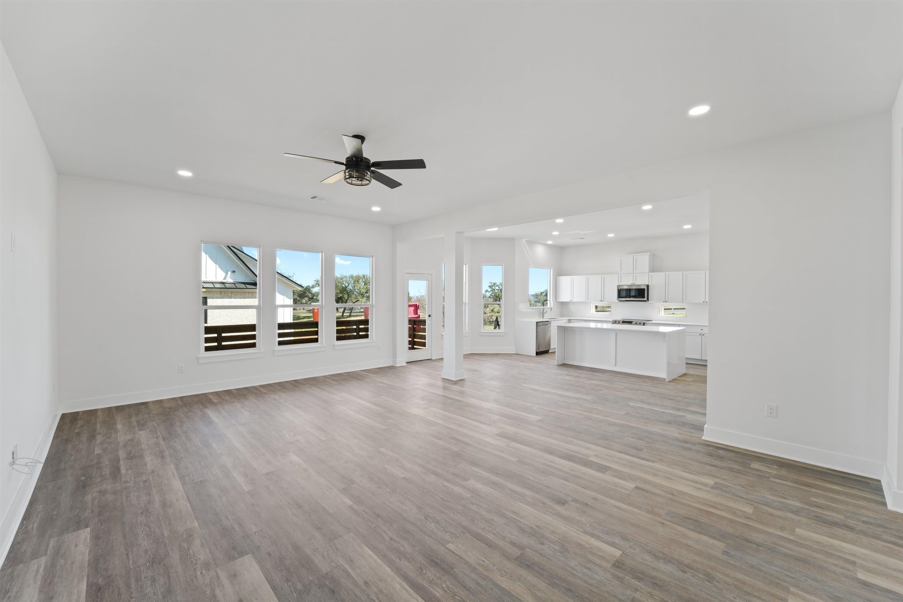 100 Up There Horseshoe Bay, TX 78657 - Photo 4 of 28 a view of a kitchen with a sink and a stove top oven
