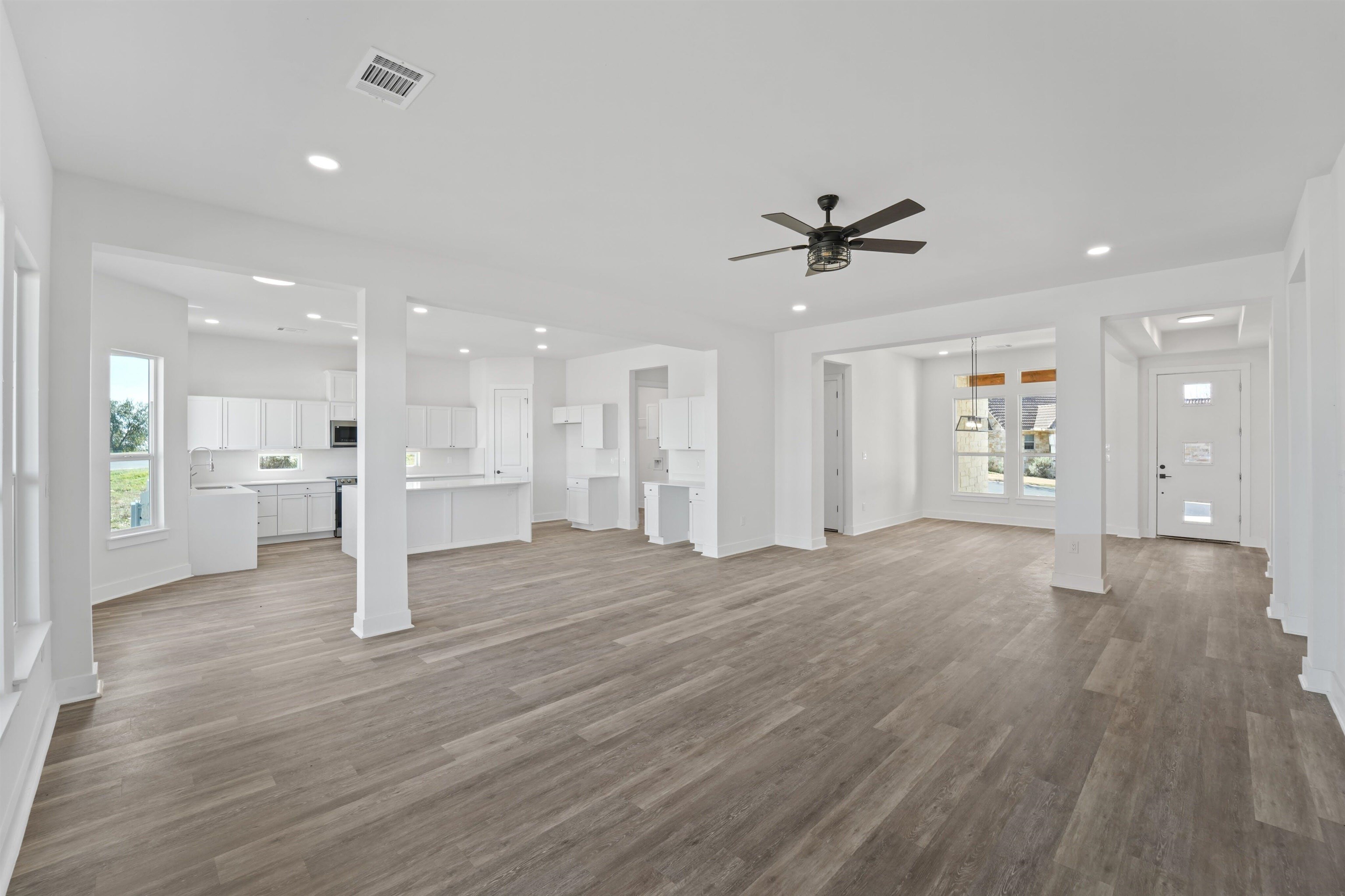 100 Up There Horseshoe Bay, TX 78657 - Photo 5 of 28 a view of an empty room with a kitchen