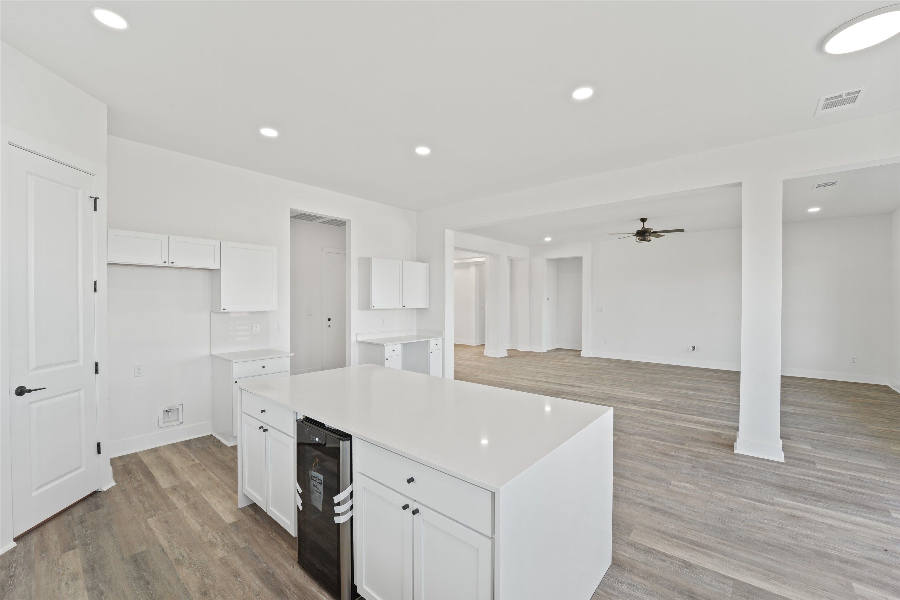 100 Up There Horseshoe Bay, TX 78657 - Photo 7 of 28 a view of a kitchen cabinets and wooden floor