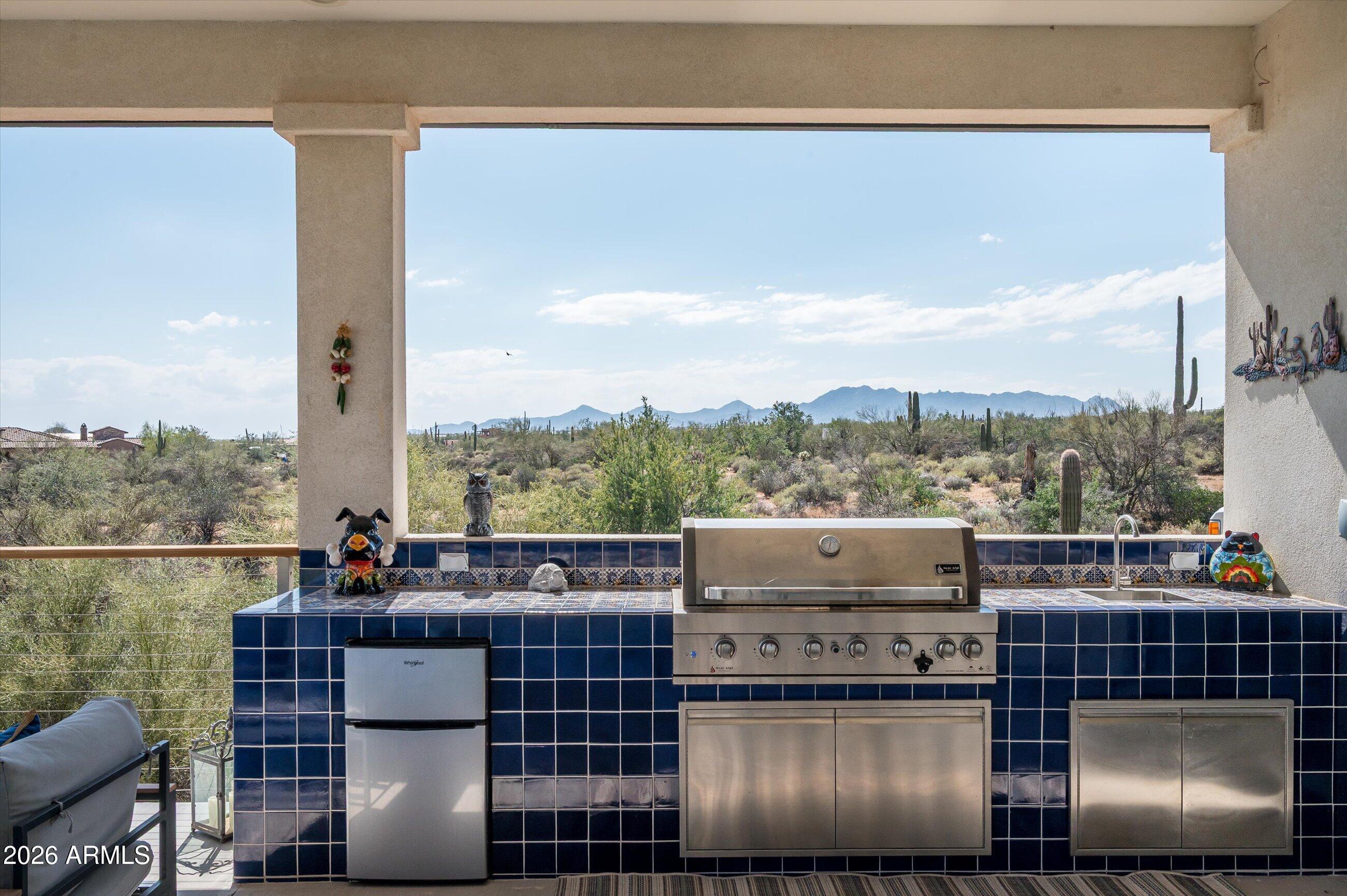 17439 East Wildcat Drive Rio Verde, AZ 85263 - Photo 17 of 25 a view of roof deck with mountain view and seating space