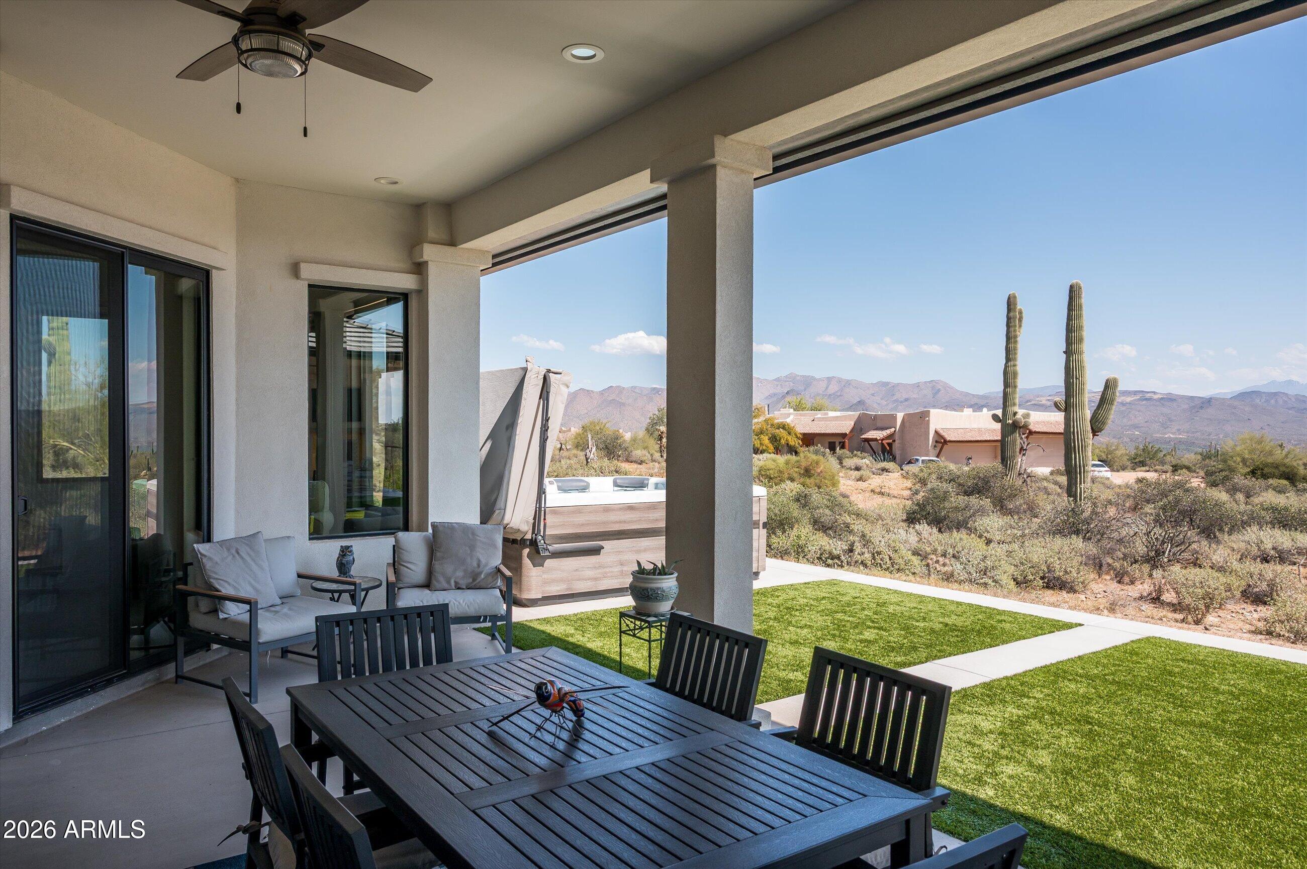 17439 East Wildcat Drive Rio Verde, AZ 85263 - Photo 18 of 25 a view of a patio with a table chairs and a patio