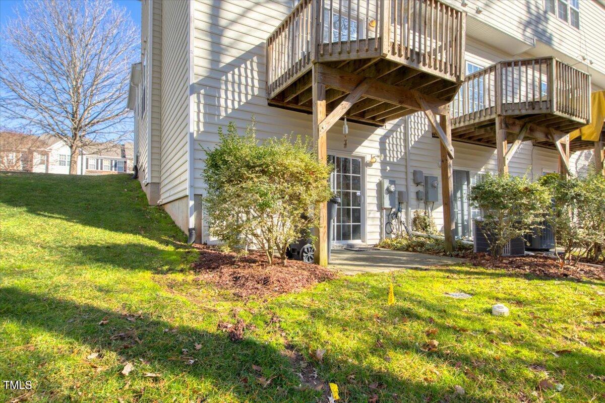 222 Cedar Elm Road Durham, NC 27713 - Photo 49 of 49 222 Cedar Elm exterior Back w patio