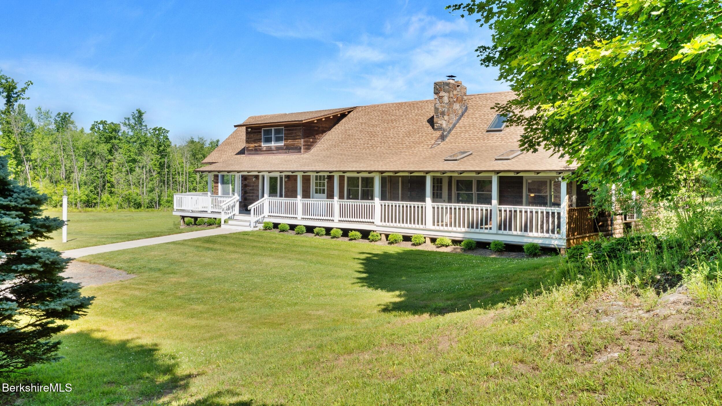 134 Hurlburt Road Great Barrington, MA 01230 - Photo 48 of 50 a view of a house with a backyard