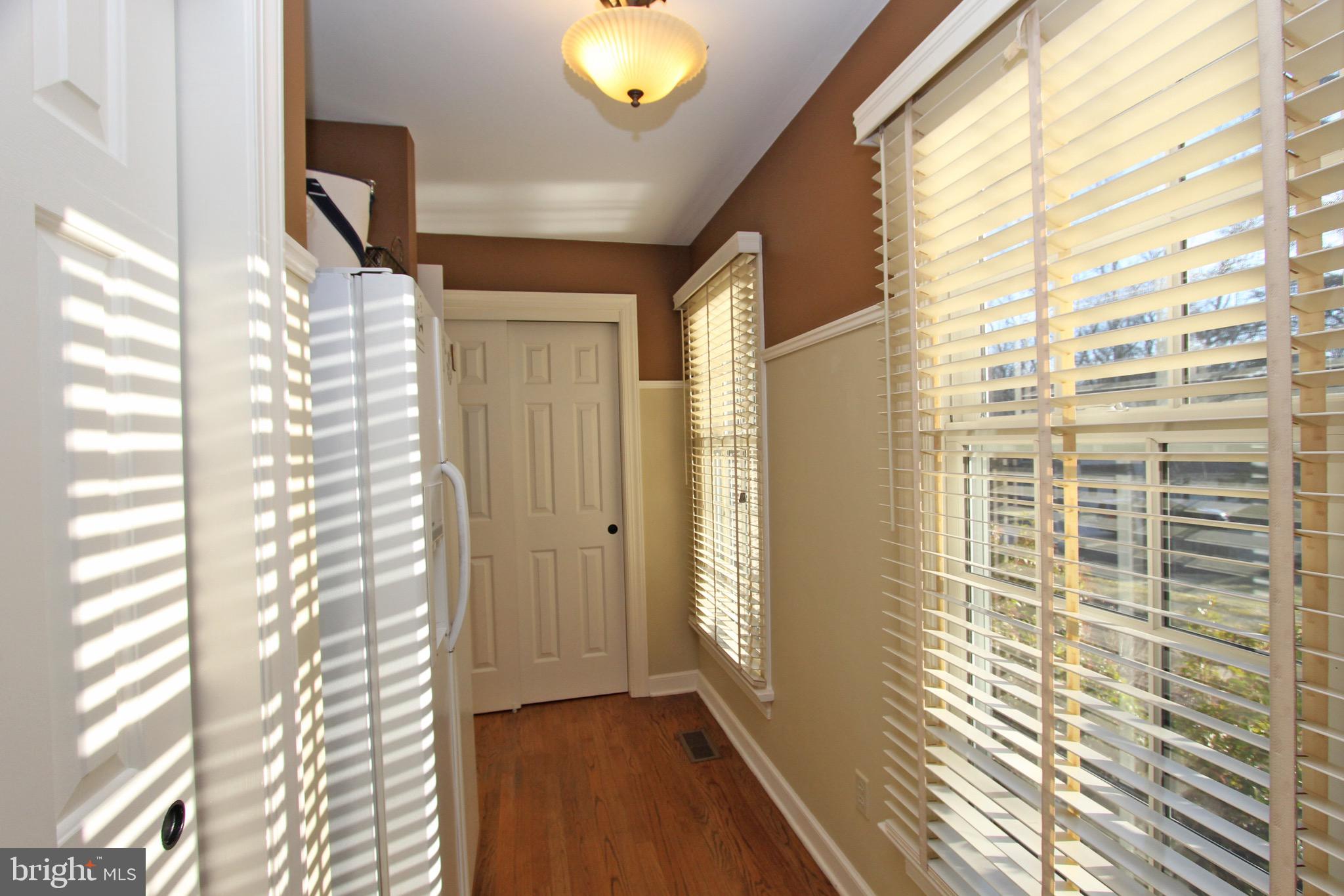 207 Ravenscliff Road Wayne, PA 19087 - Photo 25 of 68 hallway off kitchen with extra drink fridge pantry