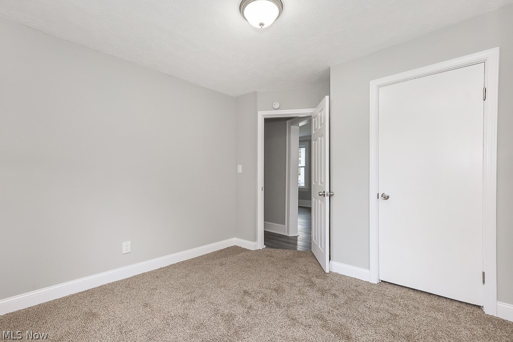 6665 State Road Cleveland, OH 44134 - Photo 22 of 30 Unfurnished bedroom featuring light carpet