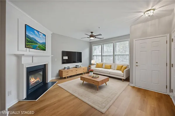 a living room with furniture or fireplace and a flat screen tv