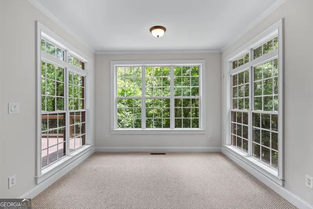 an empty room with windows