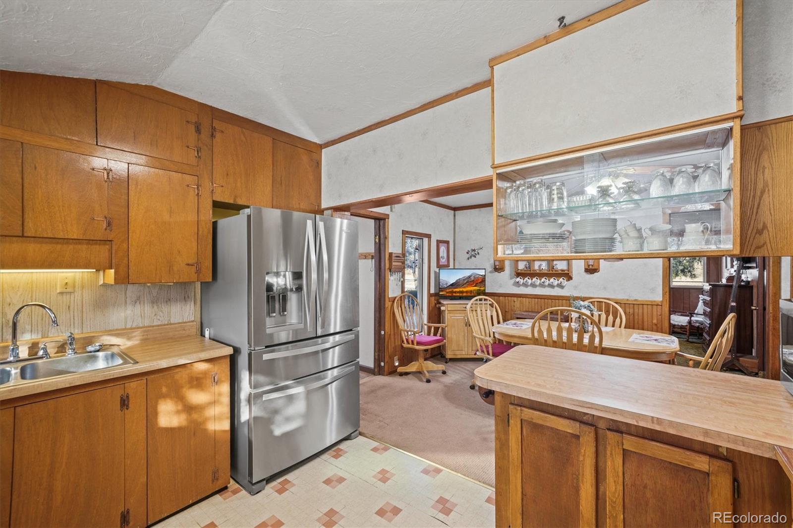 577 Main Street Elizabeth, CO 80107 - Photo 14 of 50 a kitchen with stainless steel appliances a refrigerator and a sink