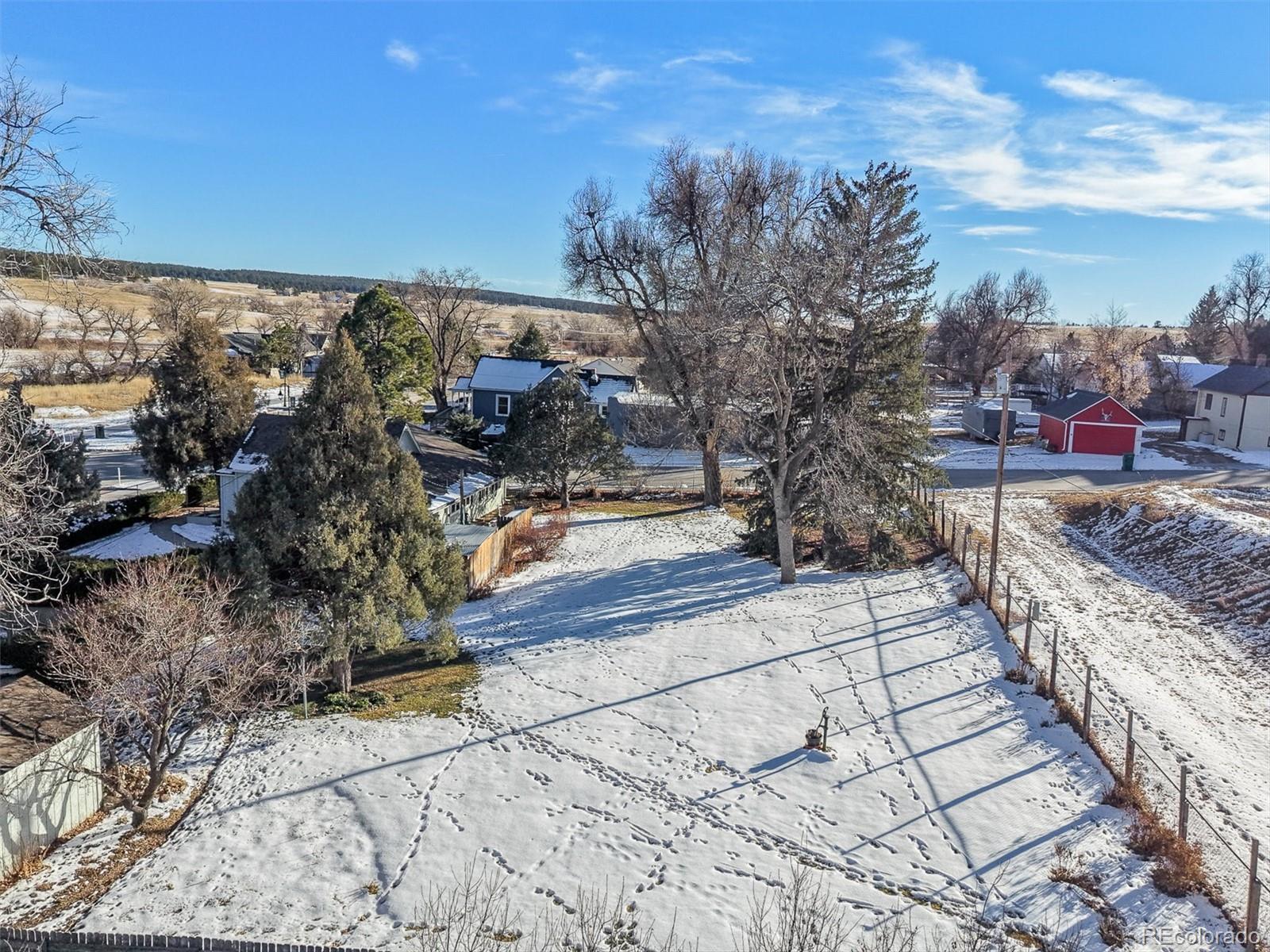 577 Main Street Elizabeth, CO 80107 - Photo 24 of 50 a view of a pathway with a yard