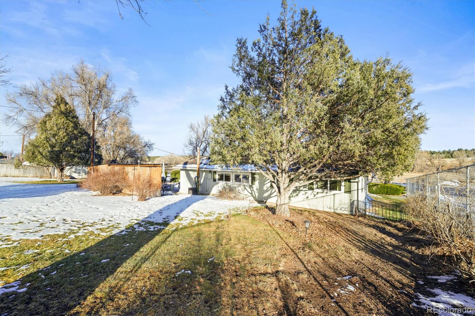 577 Main Street Elizabeth, CO 80107 - Photo 37 of 50 a view of yard covered with snow