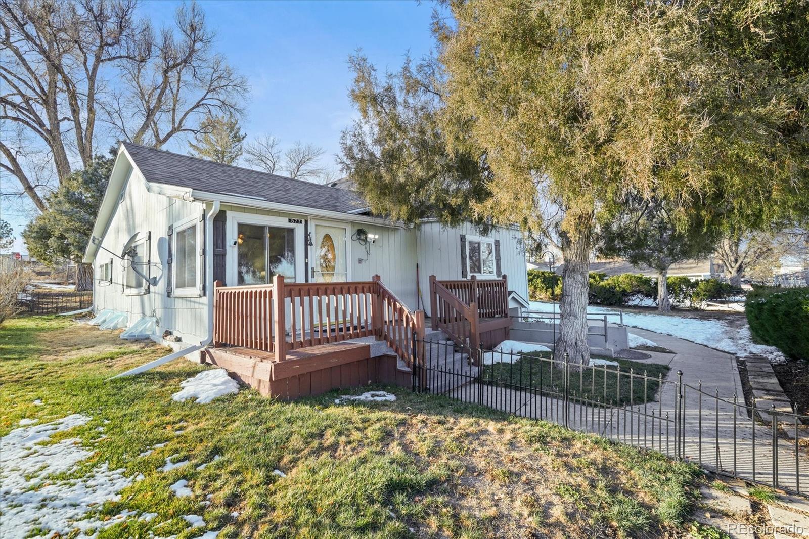 577 Main Street Elizabeth, CO 80107 - Photo 4 of 50 a view of a house with backyard and sitting area