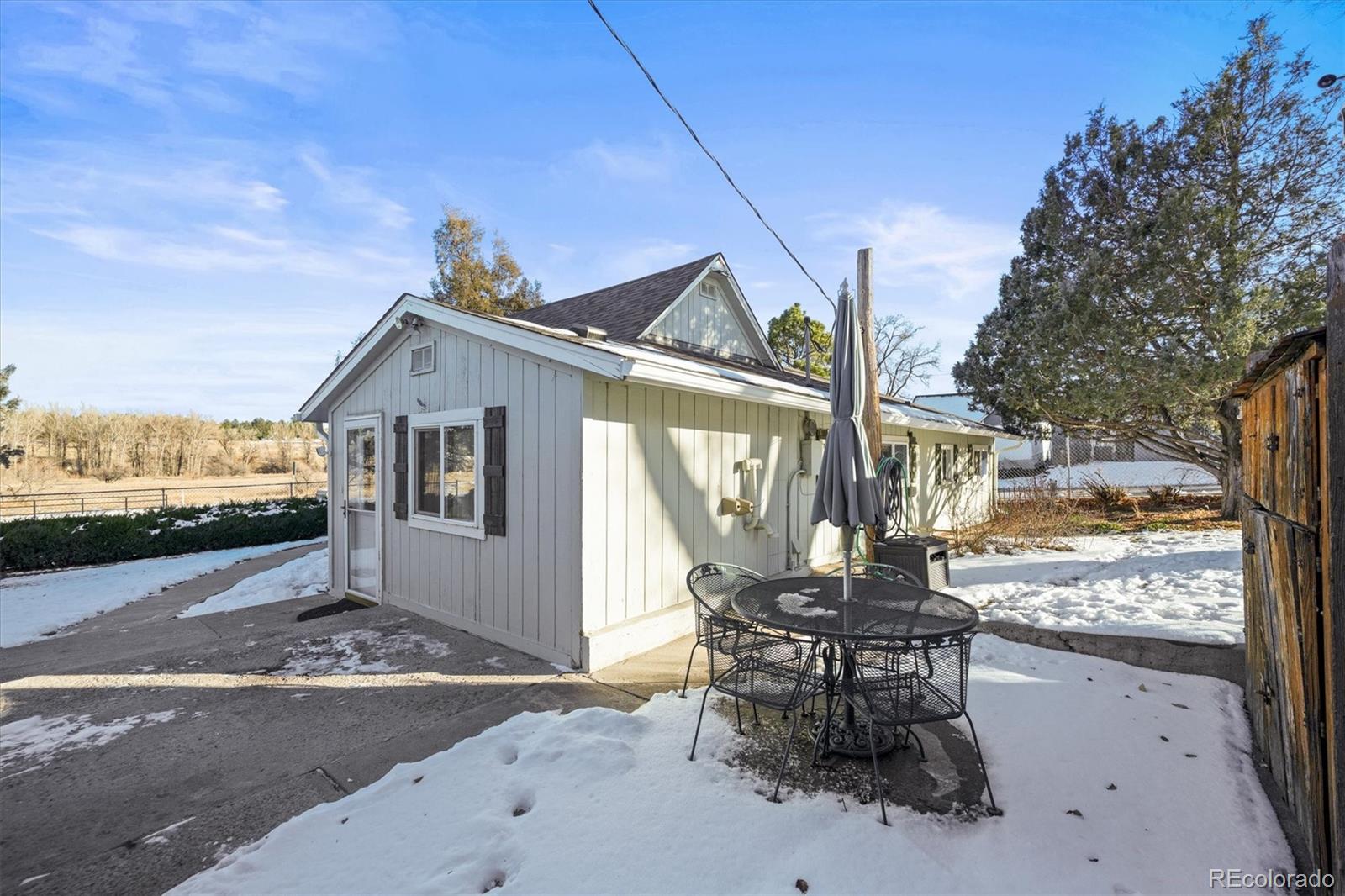 577 Main Street Elizabeth, CO 80107 - Photo 41 of 50 a front view of a house with a yard outdoor seating and mountain view in back