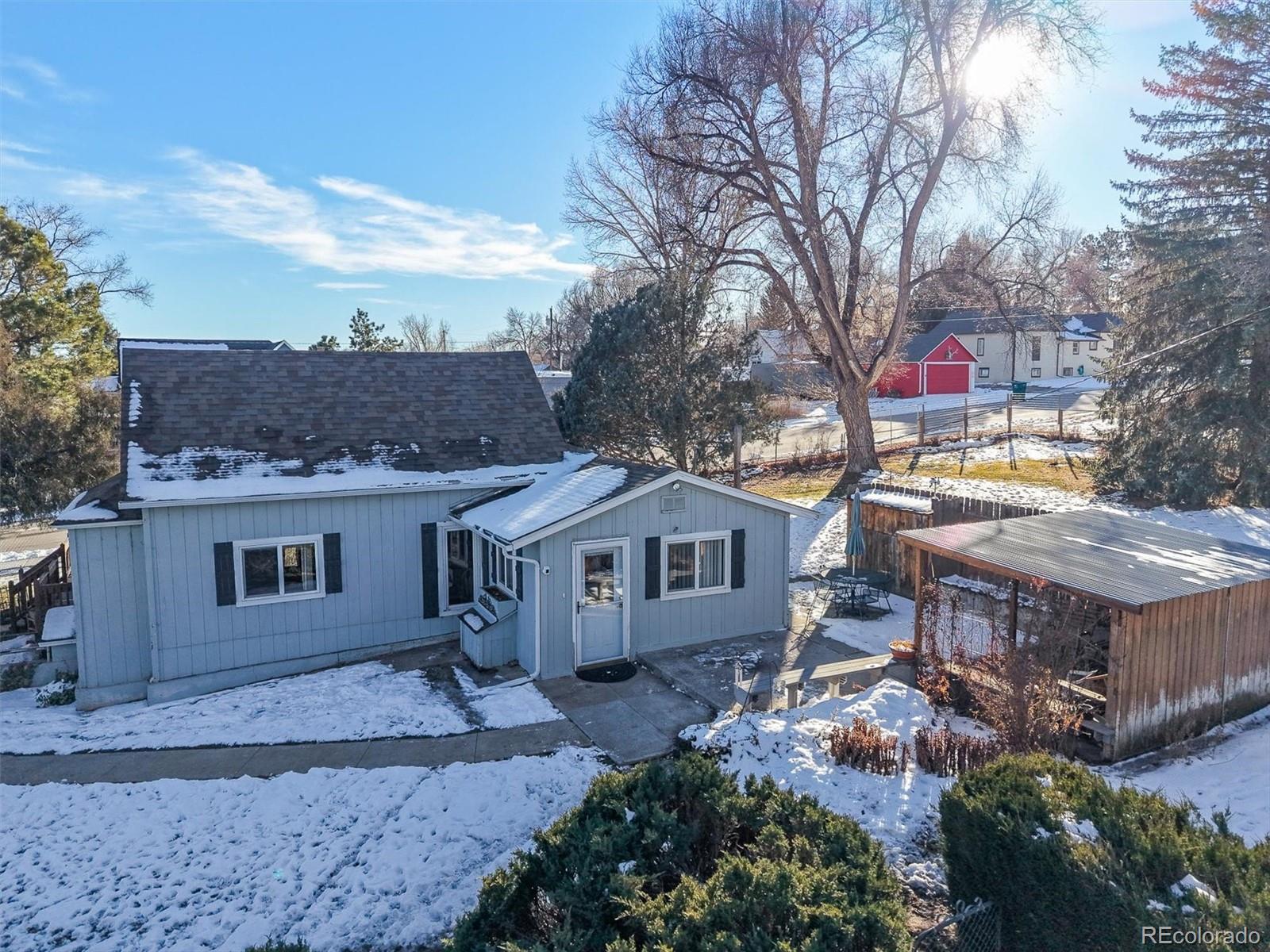 577 Main Street Elizabeth, CO 80107 - Photo 6 of 50 a view of house with a outdoor space