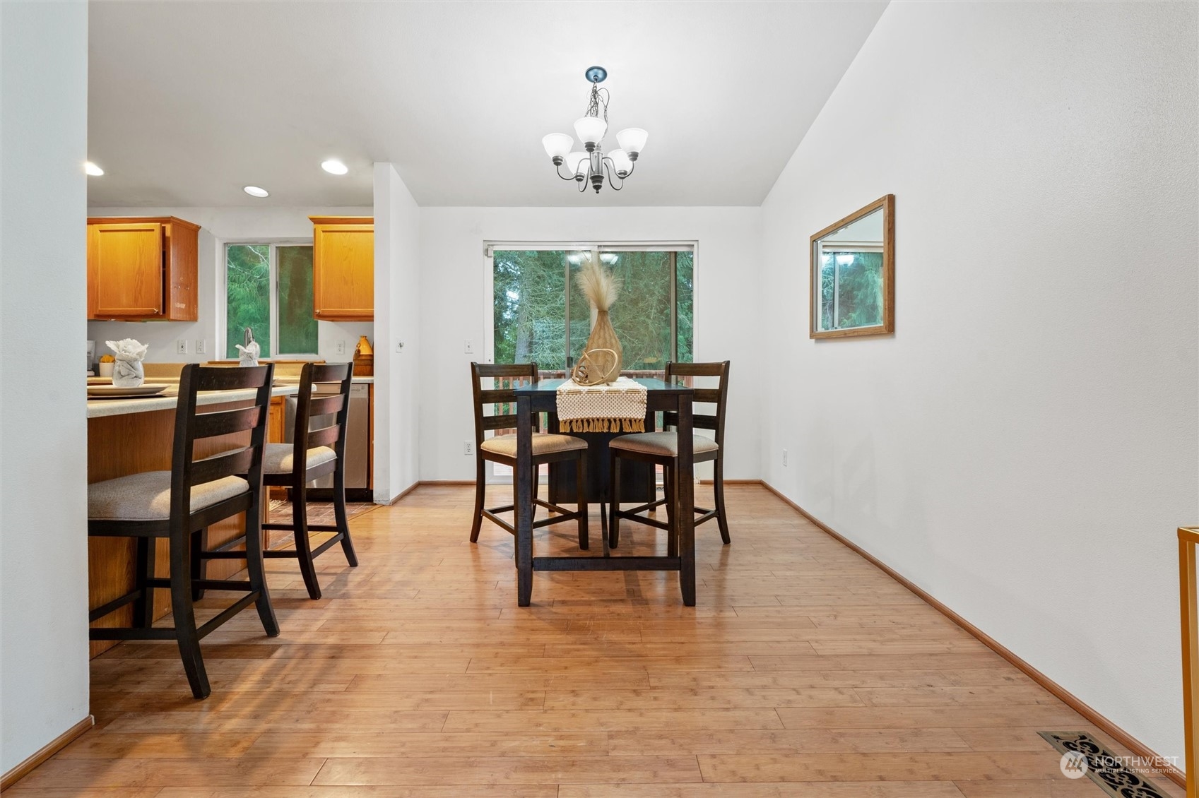 4574 Knute Anderson Road Northwest Silverdale, WA 98383 - Photo 11 of 39 a view of a dining room with furniture window and outside view