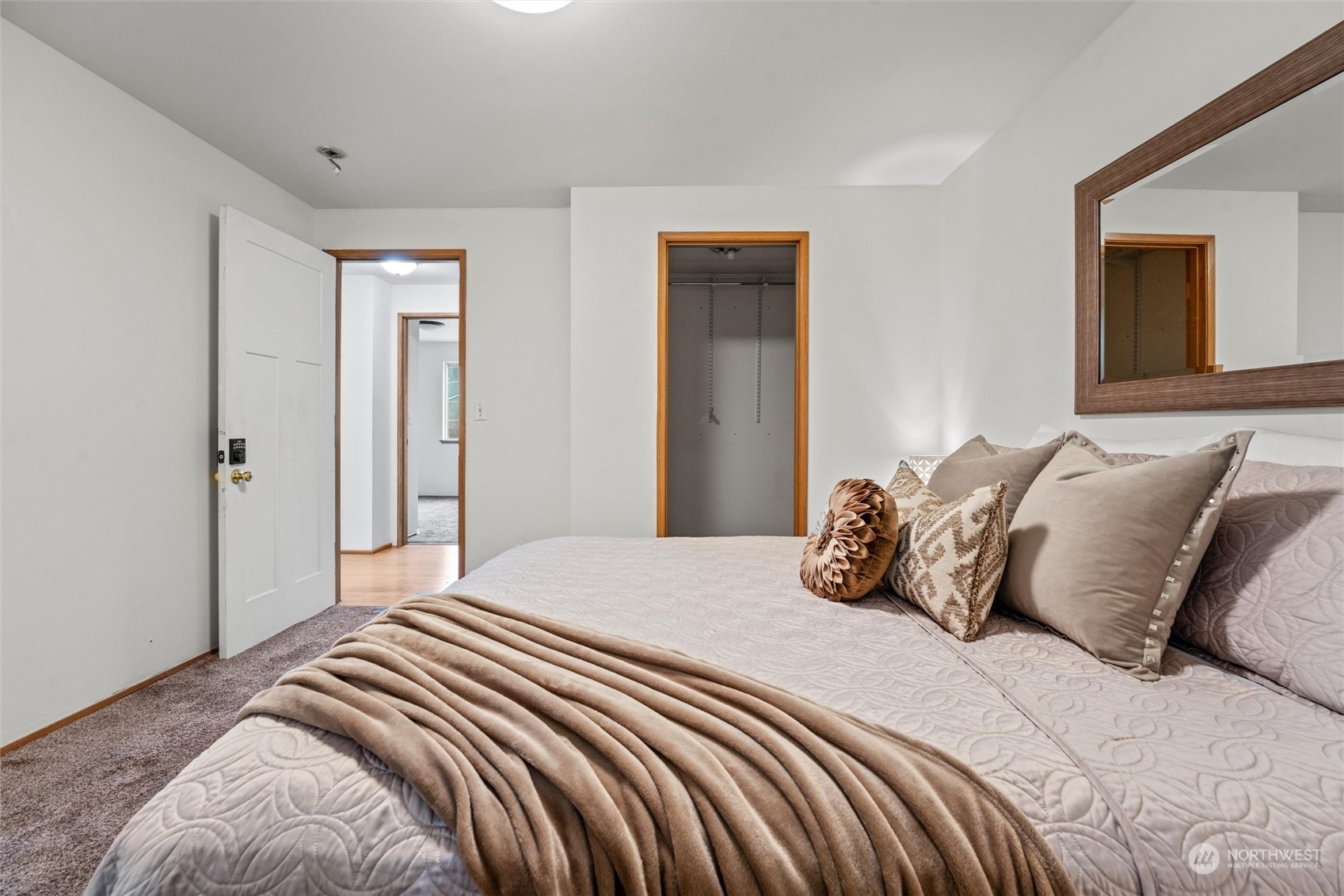 4574 Knute Anderson Road Northwest Silverdale, WA 98383 - Photo 15 of 39 a bedroom with a bed and a window