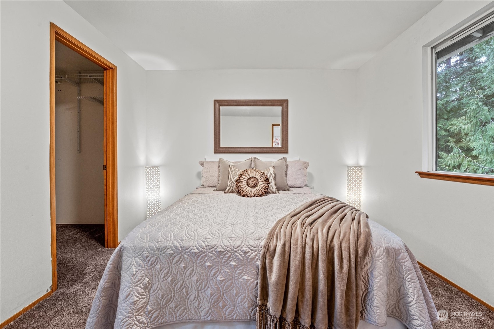 4574 Knute Anderson Road Northwest Silverdale, WA 98383 - Photo 16 of 39 a bedroom with a bed and a window