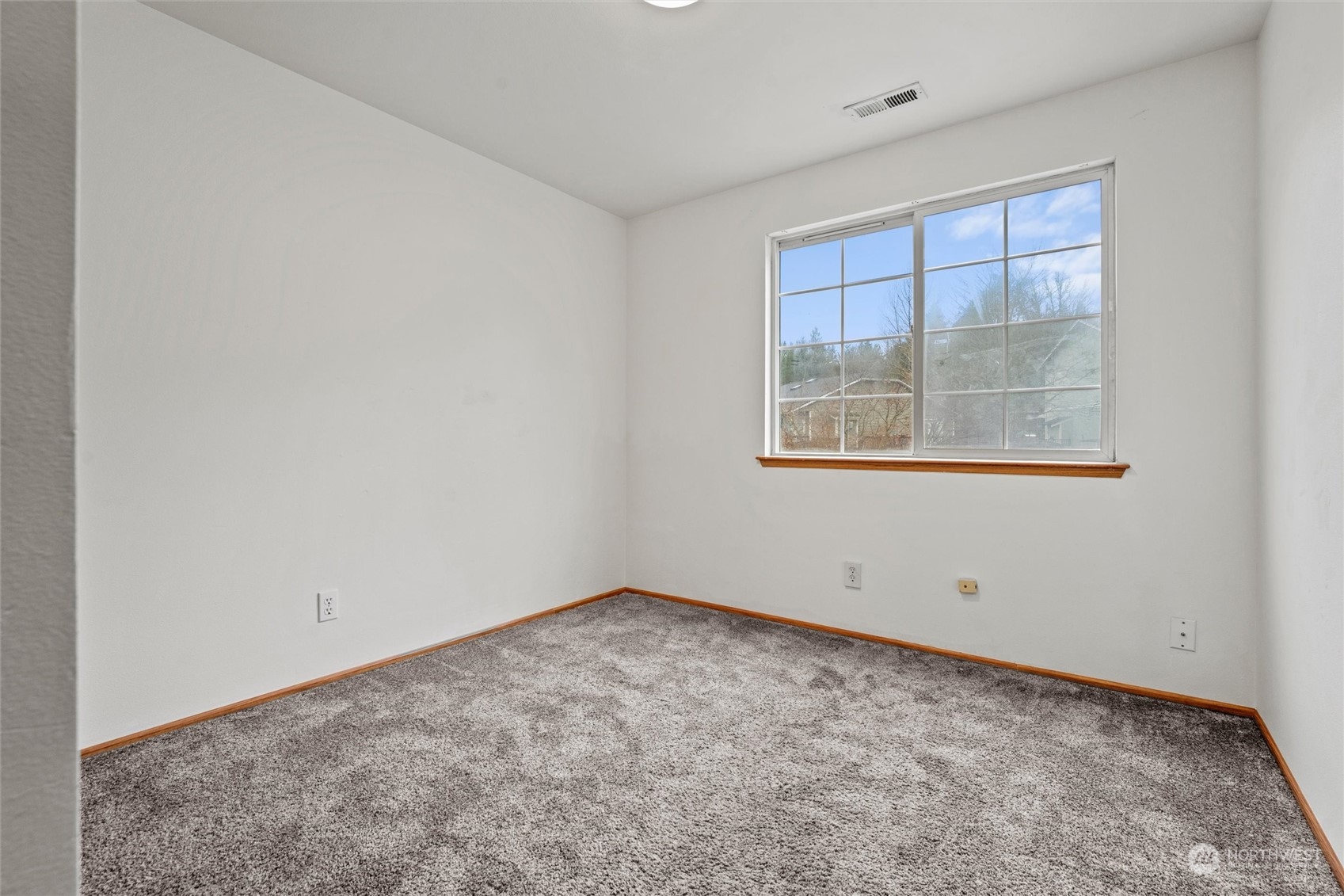 4574 Knute Anderson Road Northwest Silverdale, WA 98383 - Photo 19 of 39 an empty room with a window