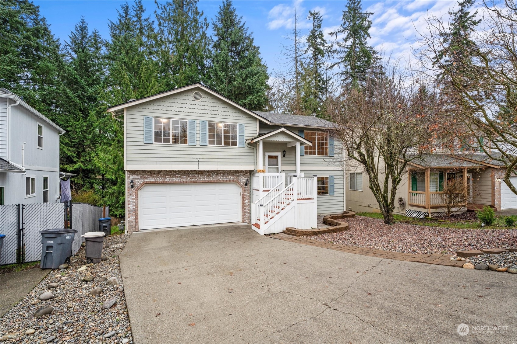 4574 Knute Anderson Road Northwest Silverdale, WA 98383 - Photo 2 of 39 a view of a house with a yard