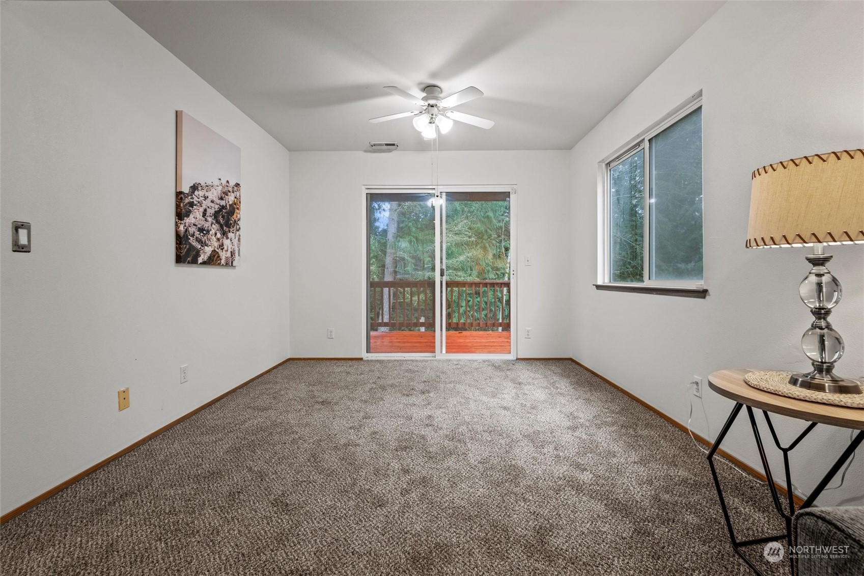 4574 Knute Anderson Road Northwest Silverdale, WA 98383 - Photo 26 of 39 a view of an empty room with a window