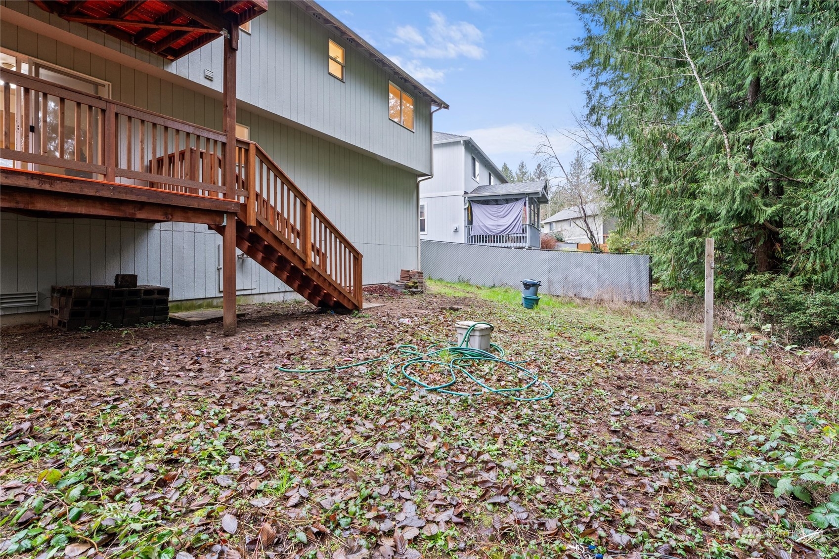 4574 Knute Anderson Road Northwest Silverdale, WA 98383 - Photo 39 of 39 a view of a house with a yard