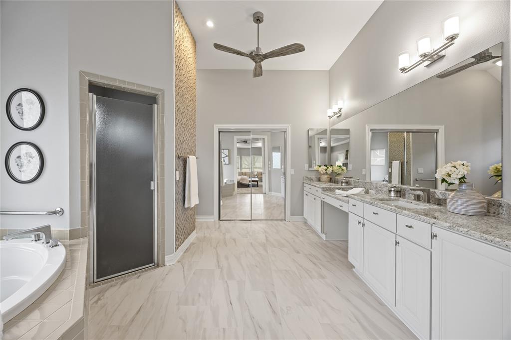 10409 Countryside Drive Denton, TX 76207 - Photo 25 of 38 Full bathroom featuring a garden tub, double vanity with granite countertops, a ceiling fan, a stall shower, and recessed lighting