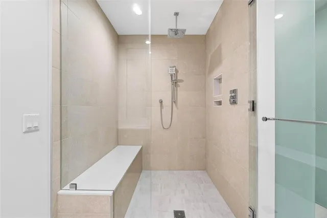 a view of a room with wooden walls and stairs