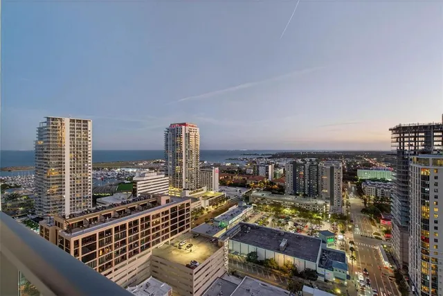a view of a balcony with city view