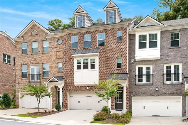 a front view of a multi story residential apartment building