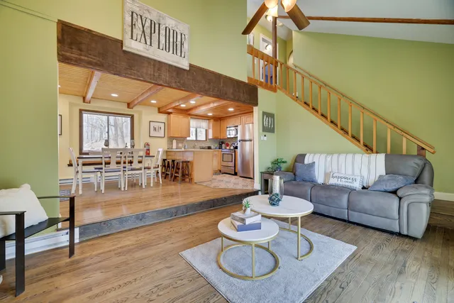 a bed room with a bed and a night stand