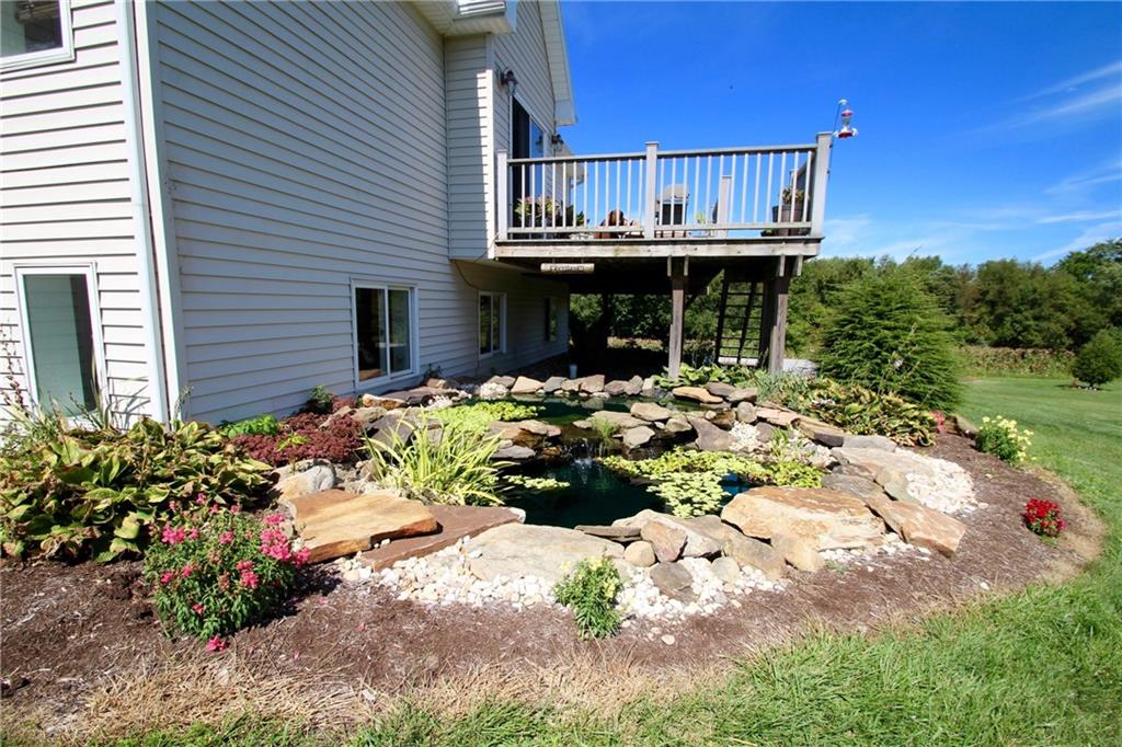 109 Ragan Road Prospect, PA 16052 - Photo 18 of 24 The landscaped grounds have been thoughtfully designed and lovingly maintained.