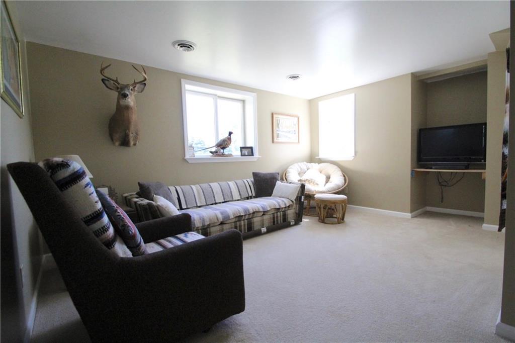 109 Ragan Road Prospect, PA 16052 - Photo 6 of 24 Cozy game room offers another private retreat inside the home.