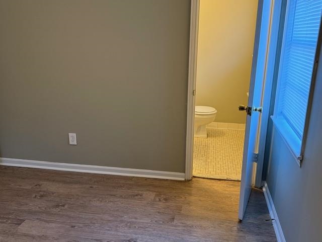 3245 Sinclair Street Memphis, TN 38127 - Photo 20 of 28 Bathroom with hardwood / wood-style flooring and toilet