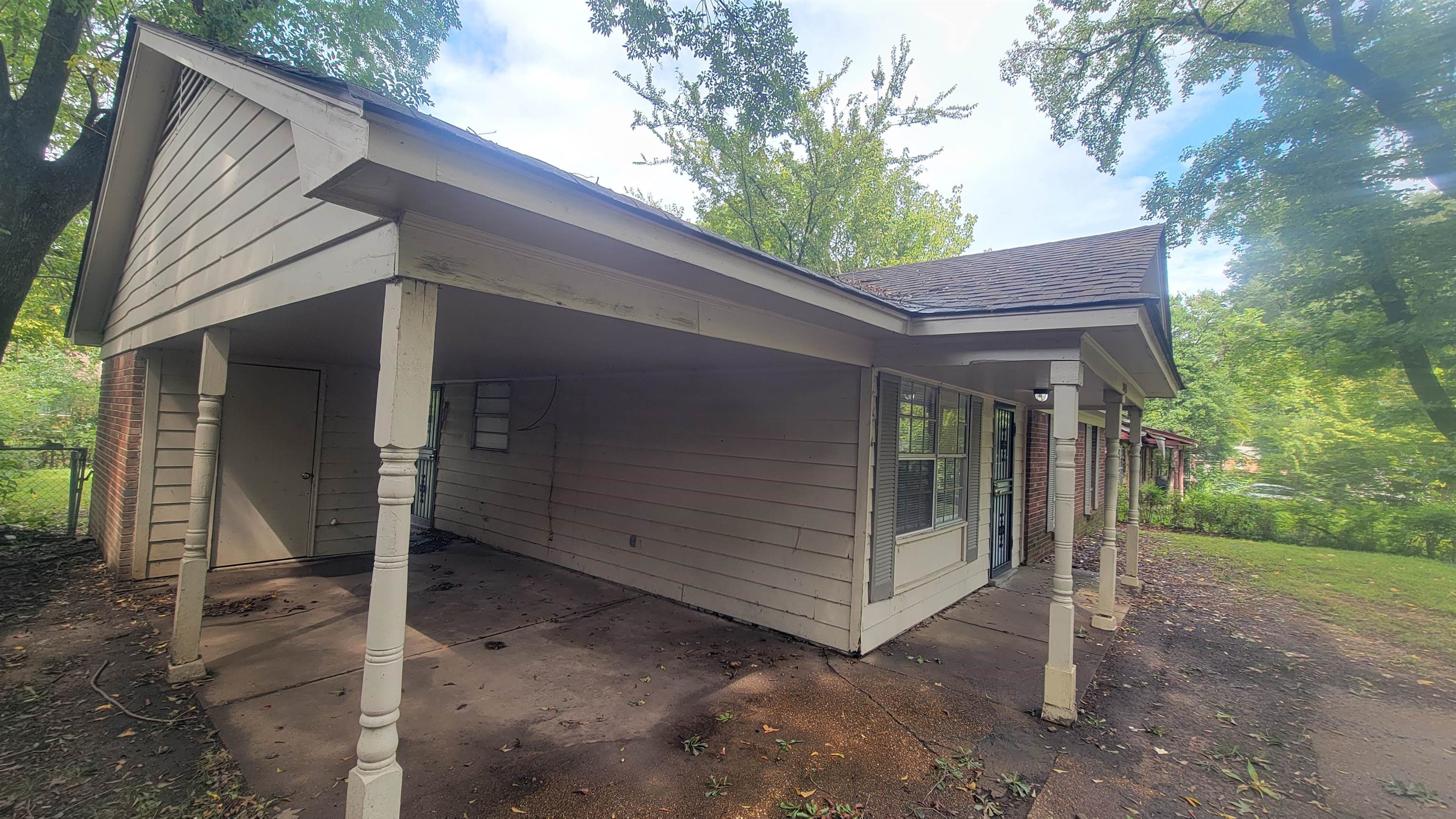 3245 Sinclair Street Memphis, TN 38127 - Photo 28 of 28 View of property exterior with a carport