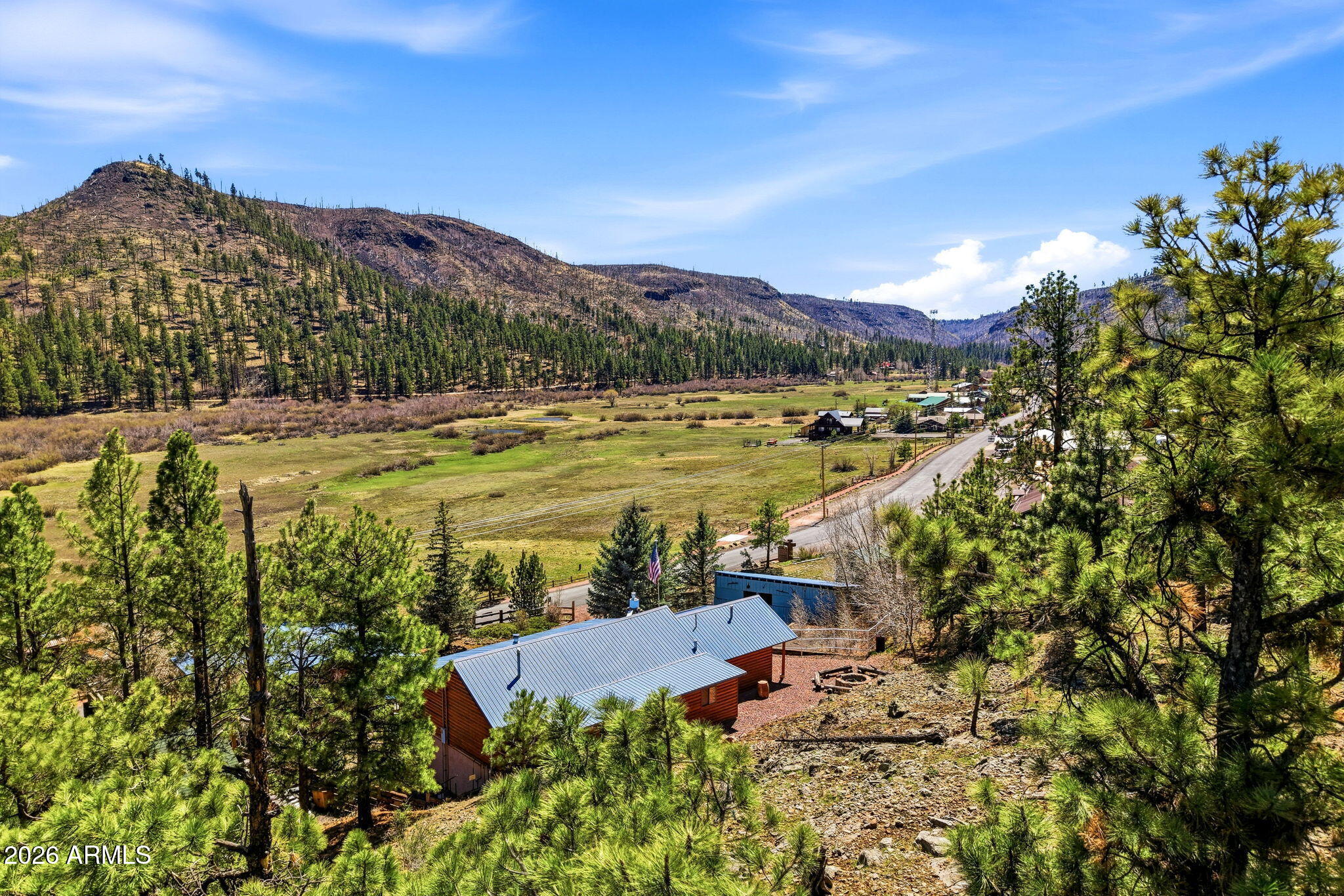 2 County Road 1013, Unit 12 Greer, AZ 85927 - Photo 4 of 15 a view of a city with mountains in the background