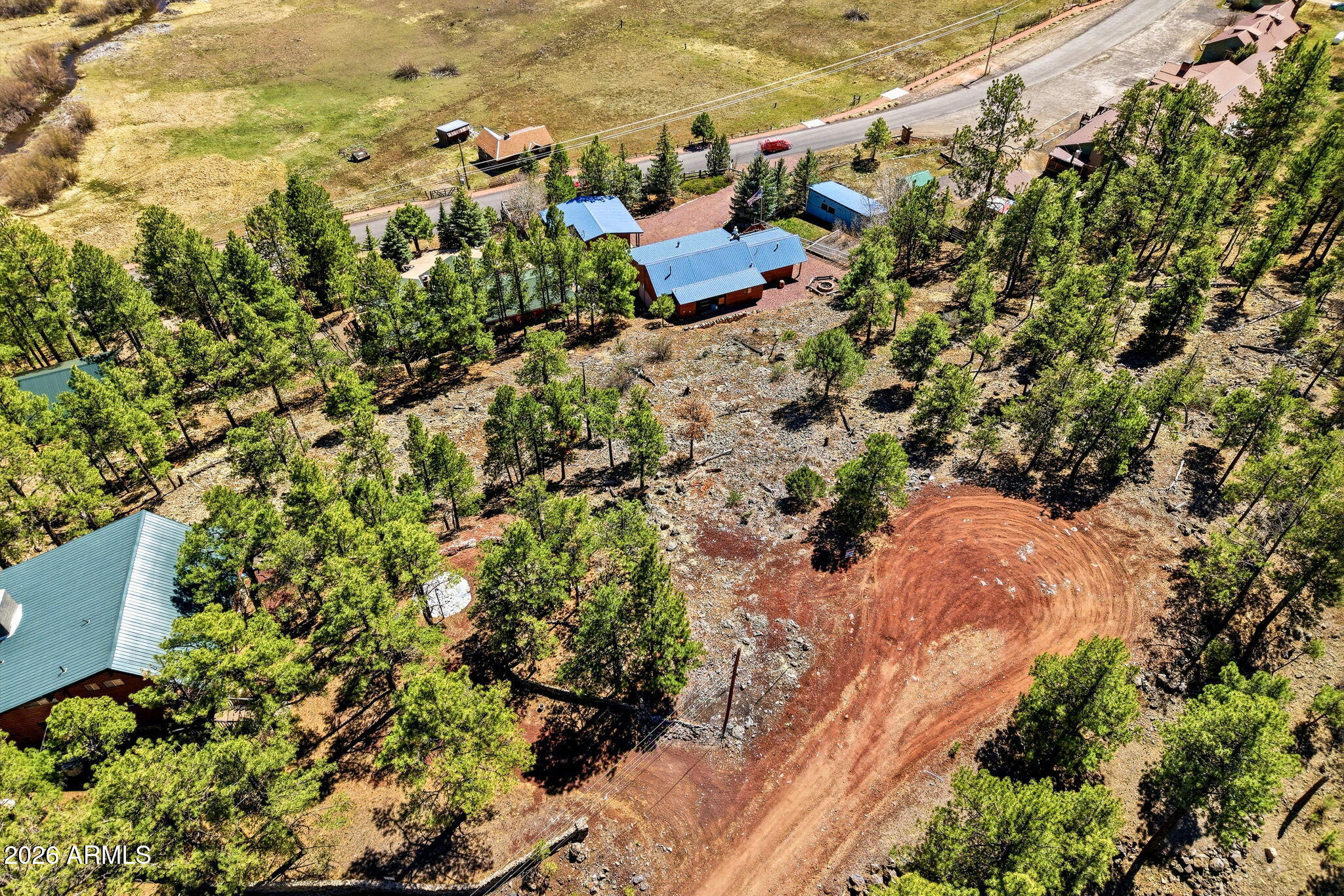 2 County Road 1013, Unit 12 Greer, AZ 85927 - Photo 8 of 15 an aerial view of residential houses with outdoor space
