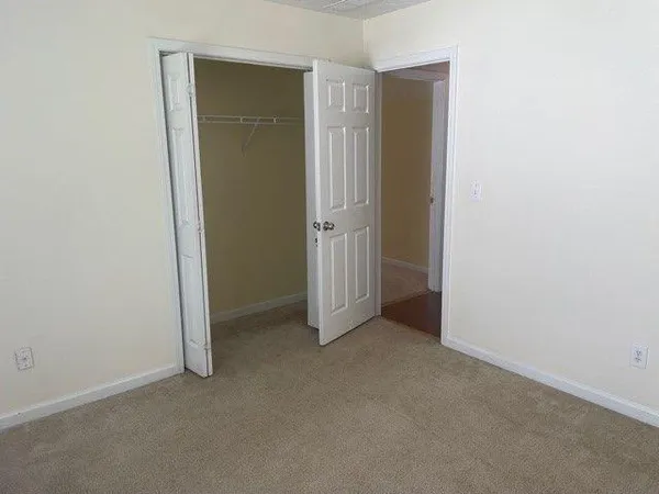 an empty room with closet