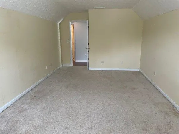 an empty room with an entryway